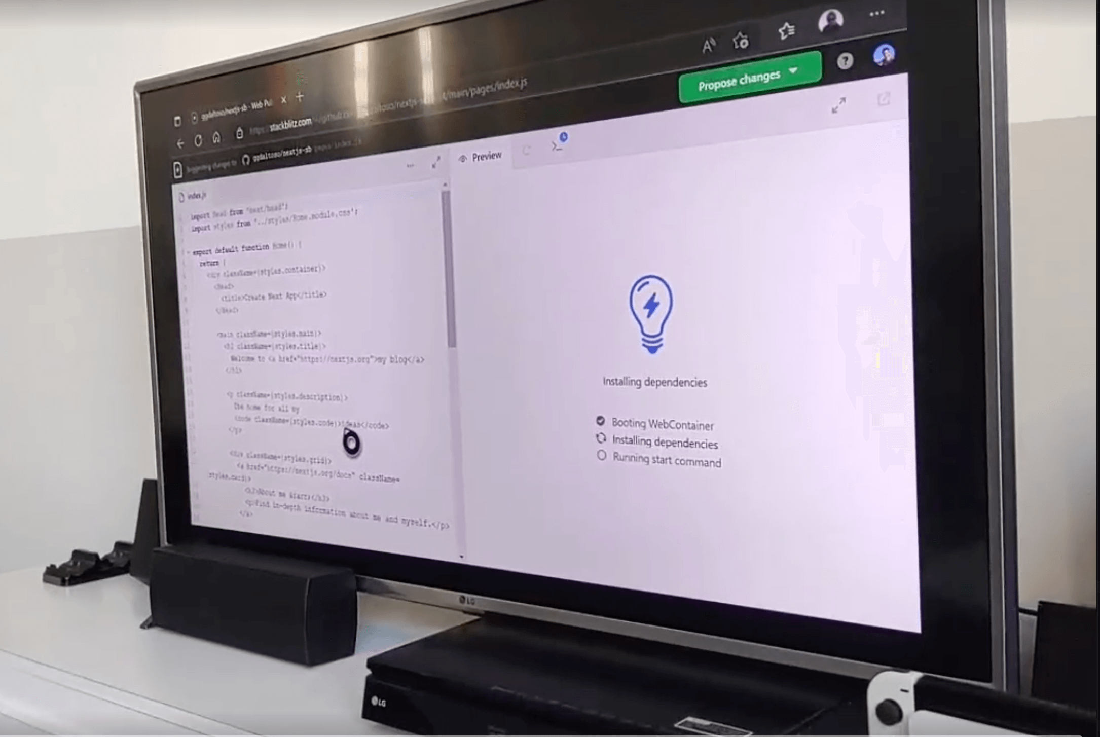 A TV showing WebContainers booting up using Xbox